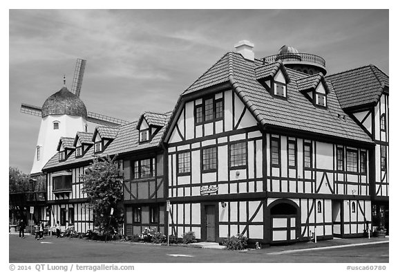 Half-timbered buildings and windmill. Solvang, California, USA (black and white)