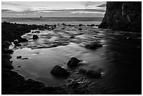 Creek flowing into ocean at dusk. Big Sur, California, USA ( black and white)