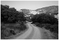 Road and hills at dusk. California, USA ( black and white)