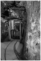 Gallery with tracks and ore car, Gold Bug Mine, Placerville. California, USA ( black and white)