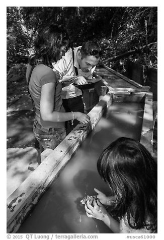 Visitors panning for gold, Gold Bug Mine, Placerville. California, USA (black and white)