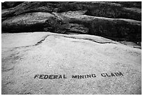 Federal Mining Claim painted on rocks, El Dorado County. California, USA ( black and white)