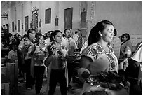 Mexican worshippers during festival, Mission San Miguel. California, USA ( black and white)