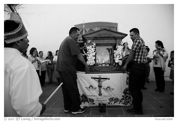 Men carrying Senor de los Milagros altar, Mission San Miguel. California, USA (black and white)