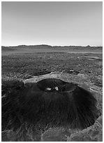 Aerial view of Amboy Crater and Bullion Mountains at dawn. Mojave Trails National Monument, California, USA ( black and white)