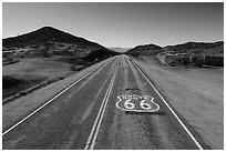 Aerial view of Route 66 with marker. Mojave Trails National Monument, California, USA ( black and white)