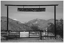 Entrance gate at dawn, Mission Creek Preserve. Sand to Snow National Monument, California, USA ( black and white)