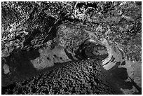 Lava tube with lumpy lava floor, Golden Dome Cave. Lava Beds National Monument, California, USA ( black and white)