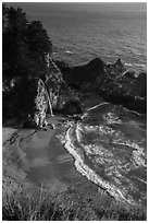 Cove and McWay waterfall dropping on beach, Julia Pfeiffer Burns State Park. Big Sur, California, USA ( black and white)