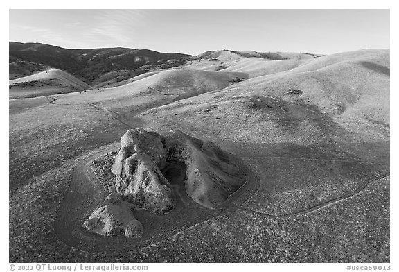 Aerial view of U-shaped rock outcrop named Painted Rock. Carrizo Plain National Monument, California, USA (black and white)