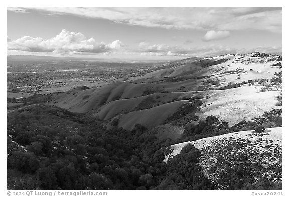 Aerial view of hills with snow overlooking Evergreen Valley. San Jose, California, USA (black and white)