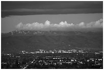 Apple headquarters, San Jose skyline, and snowy Mt Hamilton Range at dusk. San Jose, California, USA ( black and white)