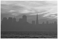 City skyline with sunset clouds seen from Treasure Island. San Francisco, California, USA (black and white)