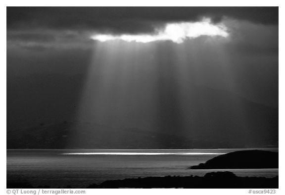 Sunbeams above the Golden Gate, seen from the Berkeley Hills. Berkeley, California, USA (black and white)