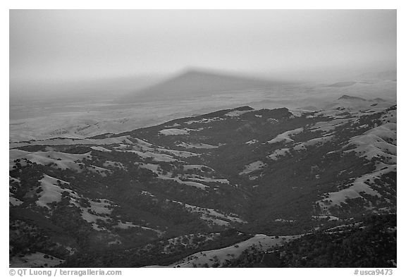 Shadow of Mt Diable projects far into the Central Valley at sunset, Mt Diablo State Park. California, USA (black and white)