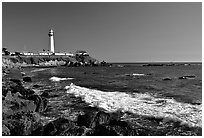 Wave and Pigeon Point Lighthouse, afternoon. San Mateo County, California, USA ( black and white)