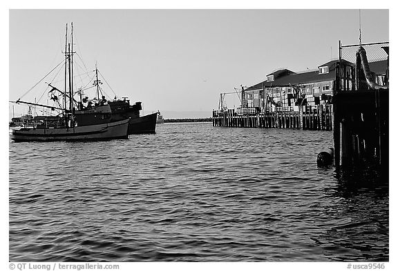Fisherman's wharf at sunset. Monterey, California, USA (black and white)