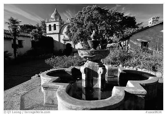 Fountain and chapel, Carmel Mission. Carmel-by-the-Sea, California, USA