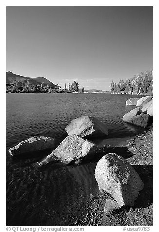 Boulders at the edge of Frog Lake, afternoon. Mokelumne Wilderness, Eldorado National Forest, California, USA (black and white)