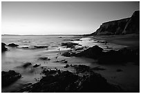 Rocks and surf, Sculptured Beach, sunset. Point Reyes National Seashore, California, USA (black and white)