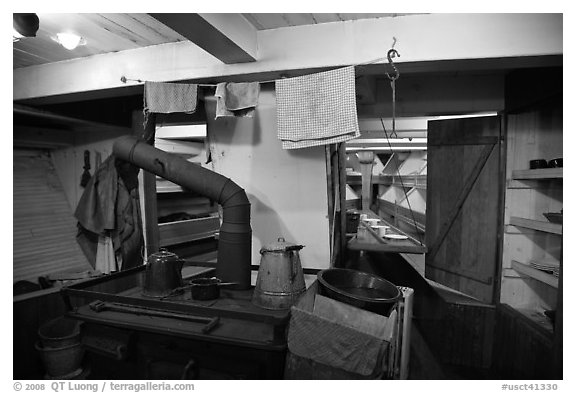 Kitchen and dining room on historic ship. Mystic, Connecticut, USA (black and white)
