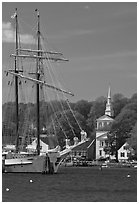 Tall ship and white steepled church. Mystic, Connecticut, USA (black and white)