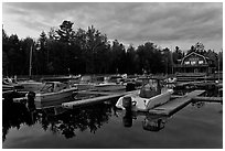 Boats in Beaver Cove Marina at dusk, Greenville. Maine, USA ( black and white)