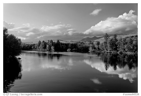 Calm Penobscot River reflects Katahdin range in the fall. Maine, USA (black and white)