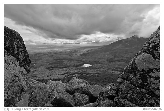 Mountain scenery in fall seen between boulders. Baxter State Park, Maine, USA (black and white)