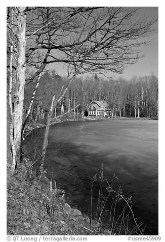 House by frozen lake. Maine, USA (black and white)