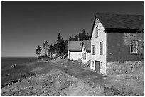 Historic houses and Penobscot Bay. Stonington, Maine, USA ( black and white)
