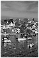 Lobster boats and houses on hillside. Stonington, Maine, USA (black and white)