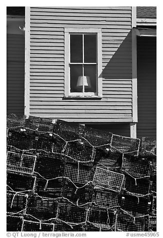 Lobster traps and window. Stonington, Maine, USA (black and white)