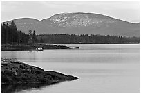 Frenchman Bay with snow-covered Cadillac Mountain in winter. Maine, USA ( black and white)