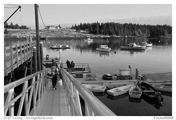 Passengers headed towards mailboat. Isle Au Haut, Maine, USA