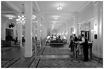 Guests entering Mount Washington hotel, Bretton Woods. New Hampshire, USA ( black and white)