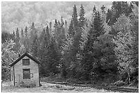 Shack and railway tracks in the fall, White Mountain National Forest. New Hampshire, USA (black and white)
