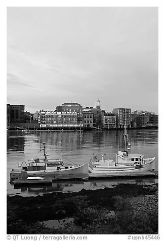 Fishing boats and Portsmouth skyline. Portsmouth, New Hampshire, USA