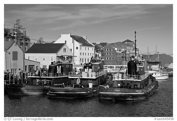 Tugboats and waterfront buildings. Portsmouth, New Hampshire, USA (black and white)