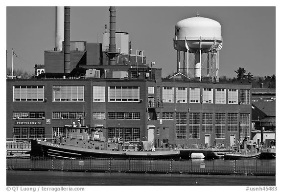 Tugboats and brick buildings, Naval Shipyard. Portsmouth, New Hampshire, USA (black and white)