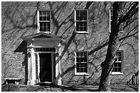 Brick house with tree shadows. Portsmouth, New Hampshire, USA (black and white)