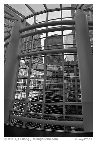 Looking through glass windows from One Beacon Court. NYC, New York, USA (black and white)