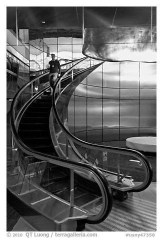 Rare curved escalator, Bloomberg Tower. NYC, New York, USA (black and white)