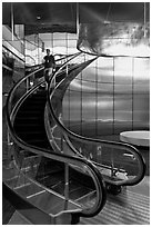 Rare curved escalator, Bloomberg Tower. NYC, New York, USA (black and white)