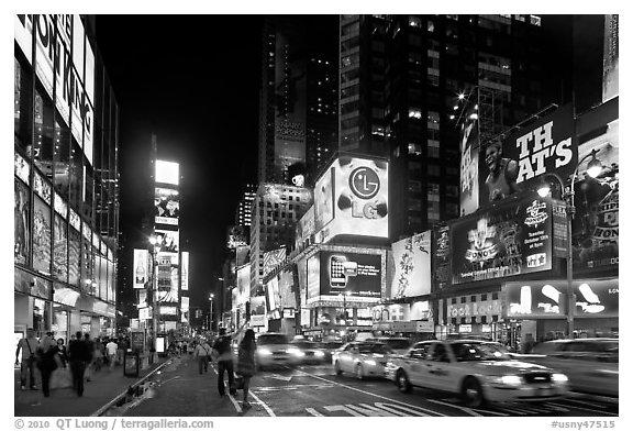 Yellow taxicabs, Times Squares at night. NYC, New York, USA (black and white)