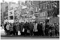 Gathering in Chinatown in winter. NYC, New York, USA ( black and white)