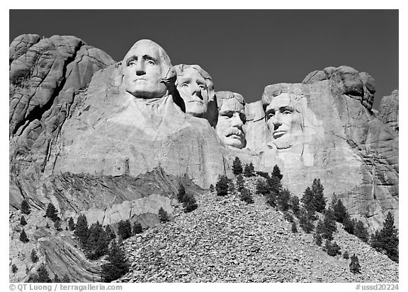 Monumental sculpture of US presidents carved in clif, Mount Rushmore National Memorial. USA (black and white)