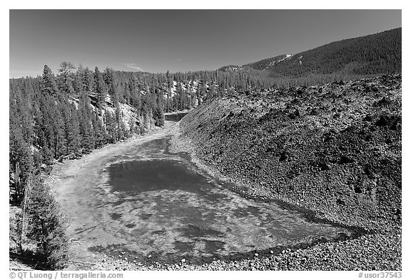 Pond at the edge of lava flow. Newberry Volcanic National Monument, Oregon, USA (black and white)