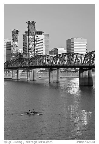 Double-oar rowboat and  Hawthorne Bridge. Portland, Oregon, USA (black and white)
