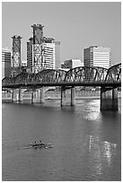Double-oar rowboat and  Hawthorne Bridge. Portland, Oregon, USA (black and white)